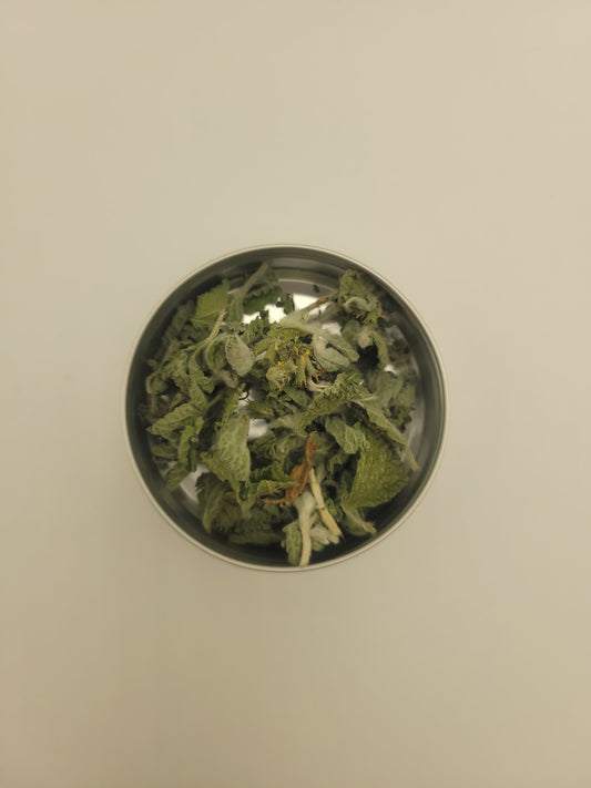Dried horehound in a small metal bowl