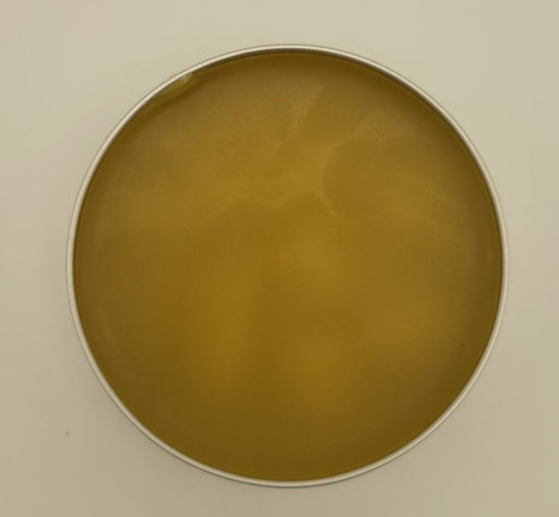 Scratch and scrape salve in tin