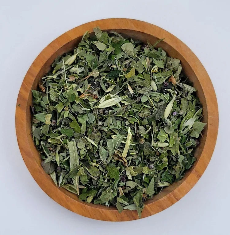 Lemon Balm Calm tea in wooden dish