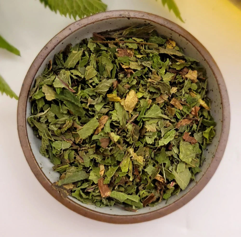 spearmint nettle tea in ceramic bowl