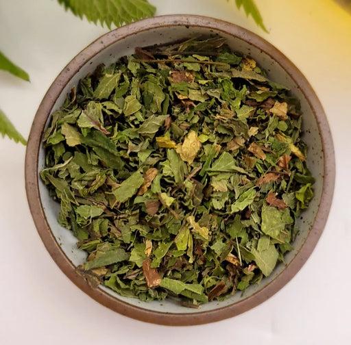 spearmint nettle tea in ceramic bowl